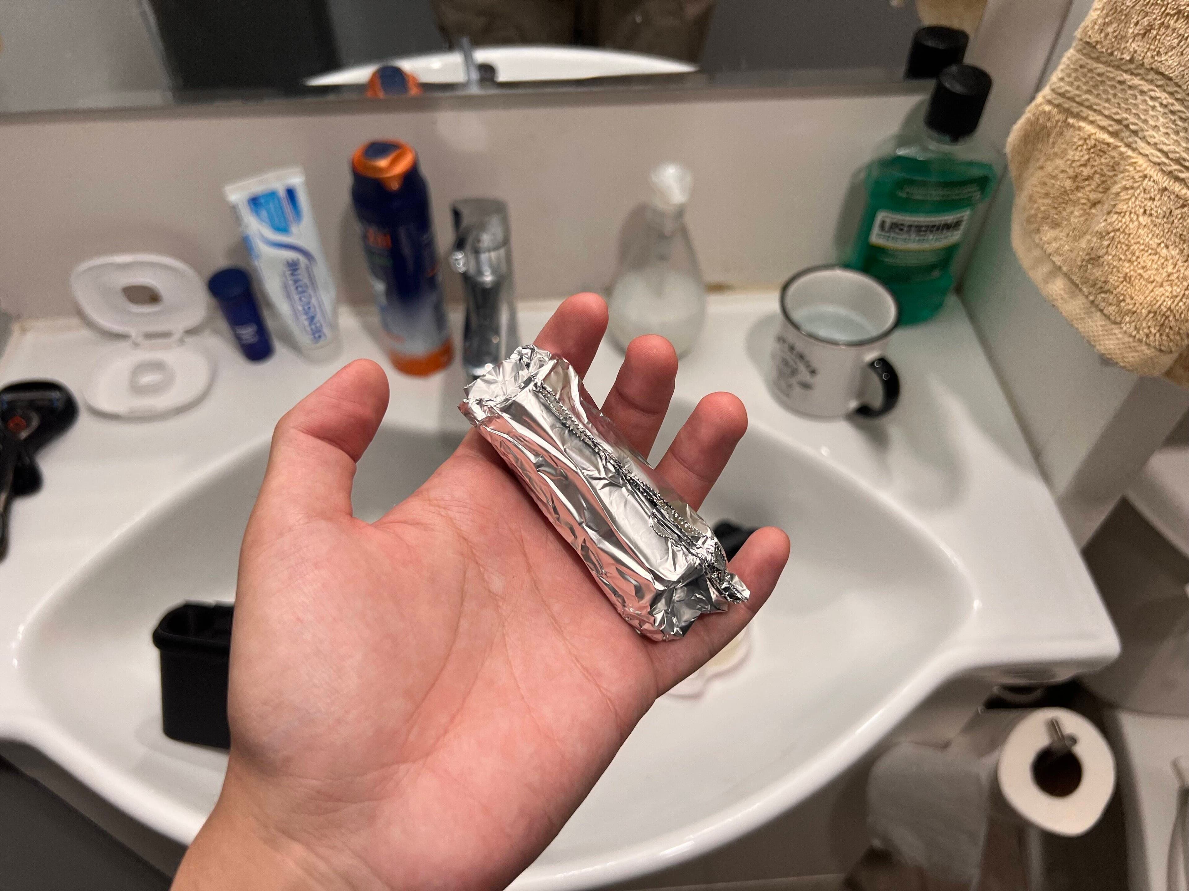 Fat roll wrapped in aluminum foil, safe from light leaks